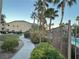 Walkway to pool area with lush landscaping at 8985 S Durango Dr # 2043, Las Vegas, NV 89113