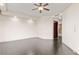 Bright bedroom with dark hardwood floors and ceiling fan at 9101 Alta Dr # 903, Las Vegas, NV 89145