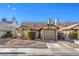 Cute ranch-style home with a well-maintained front yard and a two-car garage at 914 Clipper Dr, Henderson, NV 89015