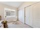 Bedroom with double closets and rocking chair at 9785 Gallo Dr, Las Vegas, NV 89147