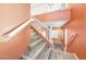 Modern staircase with light-colored wood risers and white railings at 9823 Lime Tree St, Las Vegas, NV 89178