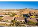 Aerial view of houses, community pool, and desert landscape at 993 Starlight Terrace Way, Mesquite, NV 89034