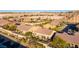 Aerial view showing houses, landscaping, and mountain background at 993 Starlight Terrace Way, Mesquite, NV 89034
