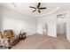 Spacious bedroom with plush carpeting and access to a private bathroom at 993 Starlight Terrace Way, Mesquite, NV 89034