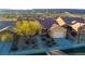 Single-story house with desert landscaping, two-car garage, and mountain views at 993 Starlight Terrace Way, Mesquite, NV 89034