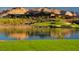 Exclusive hillside estate boasts waterfront golf course view, seamlessly integrating luxury with natural beauty at 993 Starlight Terrace Way, Mesquite, NV 89034