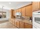 Bright kitchen featuring wood cabinets and granite countertops at 993 Starlight Terrace Way, Mesquite, NV 89034