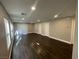 Spacious living room featuring hardwood floors and recessed lighting at 110 La Padania Ave, Las Vegas, NV 89183