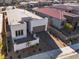 Modern single-story home with attached garage, brick driveway, and desert landscaping at 11707 Hatchling Ave, Las Vegas, NV 89138