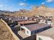 Aerial view of house, backyard, and detached garage at 11707 Hatchling Ave, Las Vegas, NV 89138