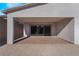 Covered patio with brick pavers and sliding glass doors at 11707 Hatchling Ave, Las Vegas, NV 89138