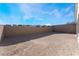 Large backyard with gravel and a block wall at 11707 Hatchling Ave, Las Vegas, NV 89138