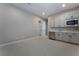 Spacious basement recreational area with kitchenette at 11707 Hatchling Ave, Las Vegas, NV 89138