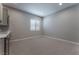 Finished basement with kitchenette and built-in cabinets at 11707 Hatchling Ave, Las Vegas, NV 89138