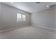 Well-lit bedroom featuring neutral walls, carpet flooring, and window with shutters at 11707 Hatchling Ave, Las Vegas, NV 89138
