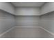 Large walk-in closet with ample shelving and hanging space at 11707 Hatchling Ave, Las Vegas, NV 89138