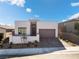 Modern single-story home with attached garage and landscaped yard at 11707 Hatchling Ave, Las Vegas, NV 89138