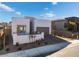 Modern single-story home with attached garage and landscaped yard at 11707 Hatchling Ave, Las Vegas, NV 89138