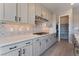 Sleek kitchen with stainless appliances & custom cabinetry at 11707 Hatchling Ave, Las Vegas, NV 89138