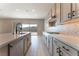 Bright kitchen with stainless steel appliances and island at 11707 Hatchling Ave, Las Vegas, NV 89138