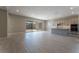 Open kitchen with island and stainless steel appliances at 11707 Hatchling Ave, Las Vegas, NV 89138