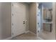 Laundry room with utility sink and built-in cabinets at 11707 Hatchling Ave, Las Vegas, NV 89138