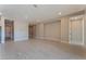 Spacious living room with wood-look flooring at 11707 Hatchling Ave, Las Vegas, NV 89138