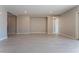 Spacious living room with tile floors and access to backyard patio at 11707 Hatchling Ave, Las Vegas, NV 89138