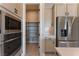 Walk-in pantry with ample shelving for storage at 11707 Hatchling Ave, Las Vegas, NV 89138