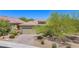 Single-story home with tile roof, and a two car garage at 1359 Skylight Way, Mesquite, NV 89034