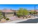 One-story house with a two-car garage and nicely landscaped yard at 1359 Skylight Way, Mesquite, NV 89034