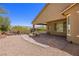 Covered patio with brick pavers and a small seating area at 1359 Skylight Way, Mesquite, NV 89034