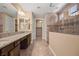 Elegant bathroom with granite countertops and large shower at 1359 Skylight Way, Mesquite, NV 89034