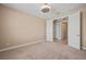 Well-lit bedroom with access to hallway bathroom and closet at 1359 Skylight Way, Mesquite, NV 89034