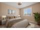 Virtually staged bedroom with plush bedding and stylish decor at 1359 Skylight Way, Mesquite, NV 89034
