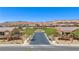 Oxen Ridge community entrance with welcoming landscaping at 1359 Skylight Way, Mesquite, NV 89034