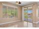 Dining room with sliding glass door to patio at 1359 Skylight Way, Mesquite, NV 89034