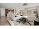 Virtually staged open kitchen with island and modern decor at 1359 Skylight Way, Mesquite, NV 89034