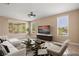 Virtually staged living room with modern furniture and decor at 1359 Skylight Way, Mesquite, NV 89034