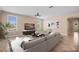 Virtually staged living room, featuring comfortable seating at 1359 Skylight Way, Mesquite, NV 89034