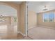 Bright and airy home office with carpet flooring and large window at 1359 Skylight Way, Mesquite, NV 89034