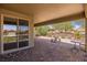Covered patio with sliding glass doors and a view of the backyard at 1359 Skylight Way, Mesquite, NV 89034