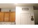 Walk-in pantry with wood shelving at 1550 Visible Ave, North Las Vegas, NV 89031