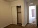 Spacious bedroom with a large closet and door to hallway at 1706 Pondering Ave, North Las Vegas, NV 89031
