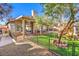 Large backyard with covered patio and play area at 1806 Hollyberry Ct, Las Vegas, NV 89142