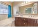 Bathroom with a double vanity and a soaking tub at 1806 Hollyberry Ct, Las Vegas, NV 89142