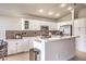 Modern kitchen with white cabinets and stainless steel appliances at 1806 Hollyberry Ct, Las Vegas, NV 89142