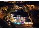 Luxury home with pool and expansive city views at night at 2 Yorkridge Ct, Henderson, NV 89052