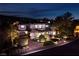 Luxury home with beautifully landscaped yard at night at 2 Yorkridge Ct, Henderson, NV 89052