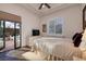 Bright bedroom with private patio access and neutral decor at 2 Yorkridge Ct, Henderson, NV 89052